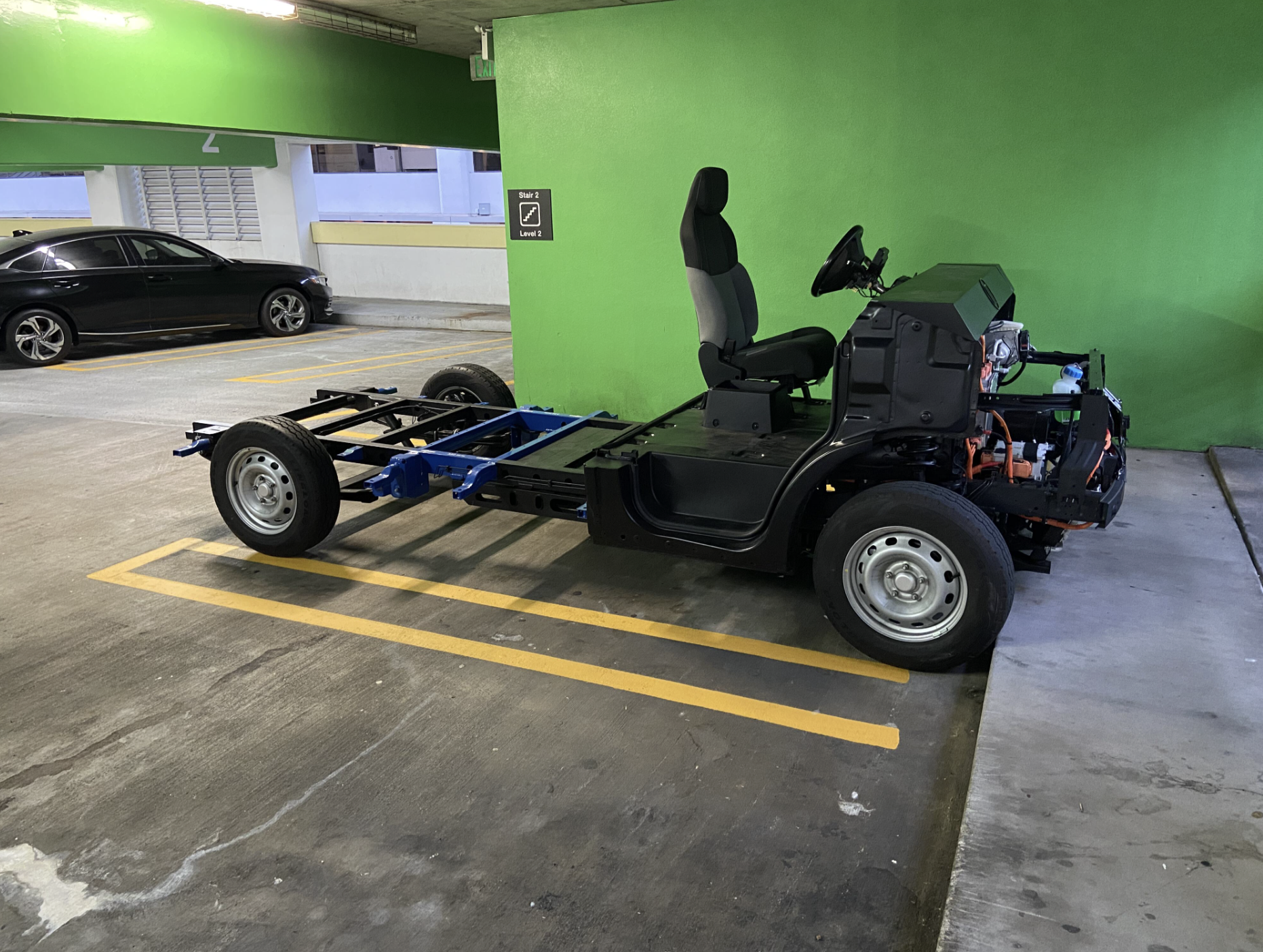 Customer viewing the EV skateboard platform